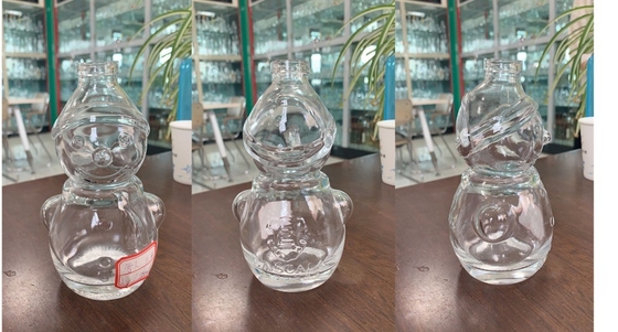 Durchsichtige Flachsglas-Schneemann-Form Whisky-Flasche mit Decal-Oberflächenbehandlung
