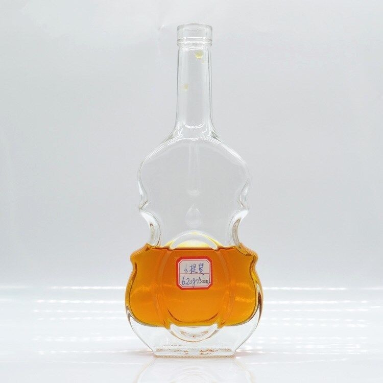 Big Good 700ml 750g transparente Glasverpackung für besondere Form Violin Schädel Flasche